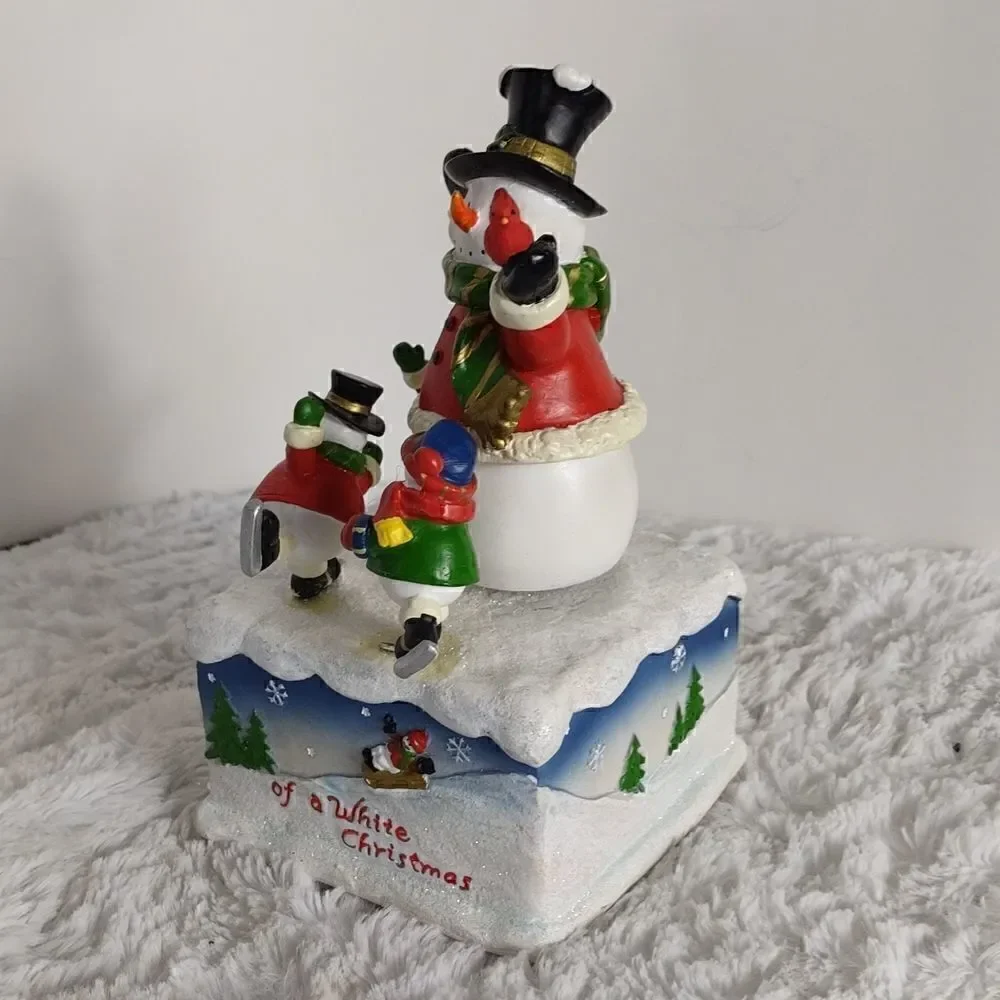 Musical Snowman Family Spinning Figurine